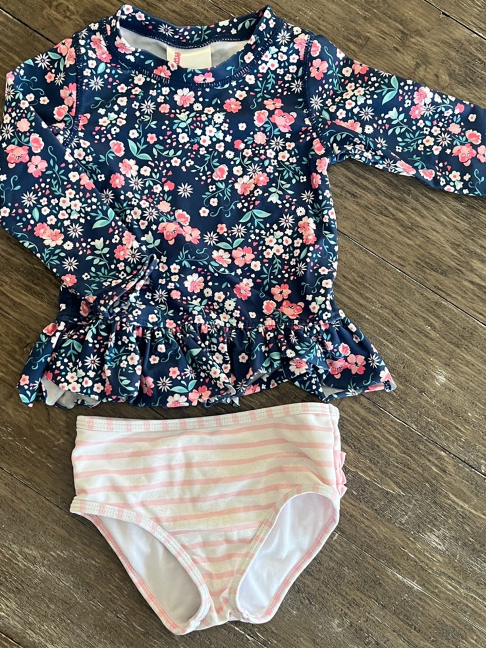 Ruffle Butts Navy Floral Long-Sleeve Rashguard with Pink Striped Bottoms
